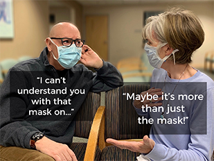 Couple with masks talking about hearing loss and balance